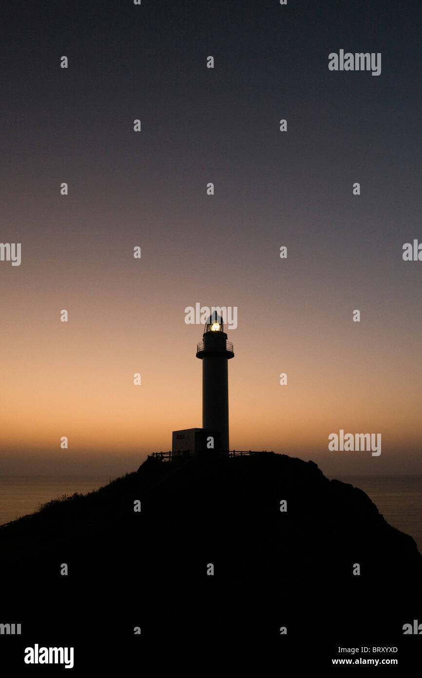 Lighthouse at dusk, Okinawa Prefecture, Japan Stock Photo