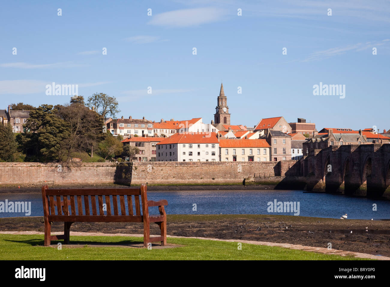 View across the River Tweed to Berwick upon Tweed town waterfront by the old bridge from Tweedmouth Northumberland England UK Britain. Stock Photo