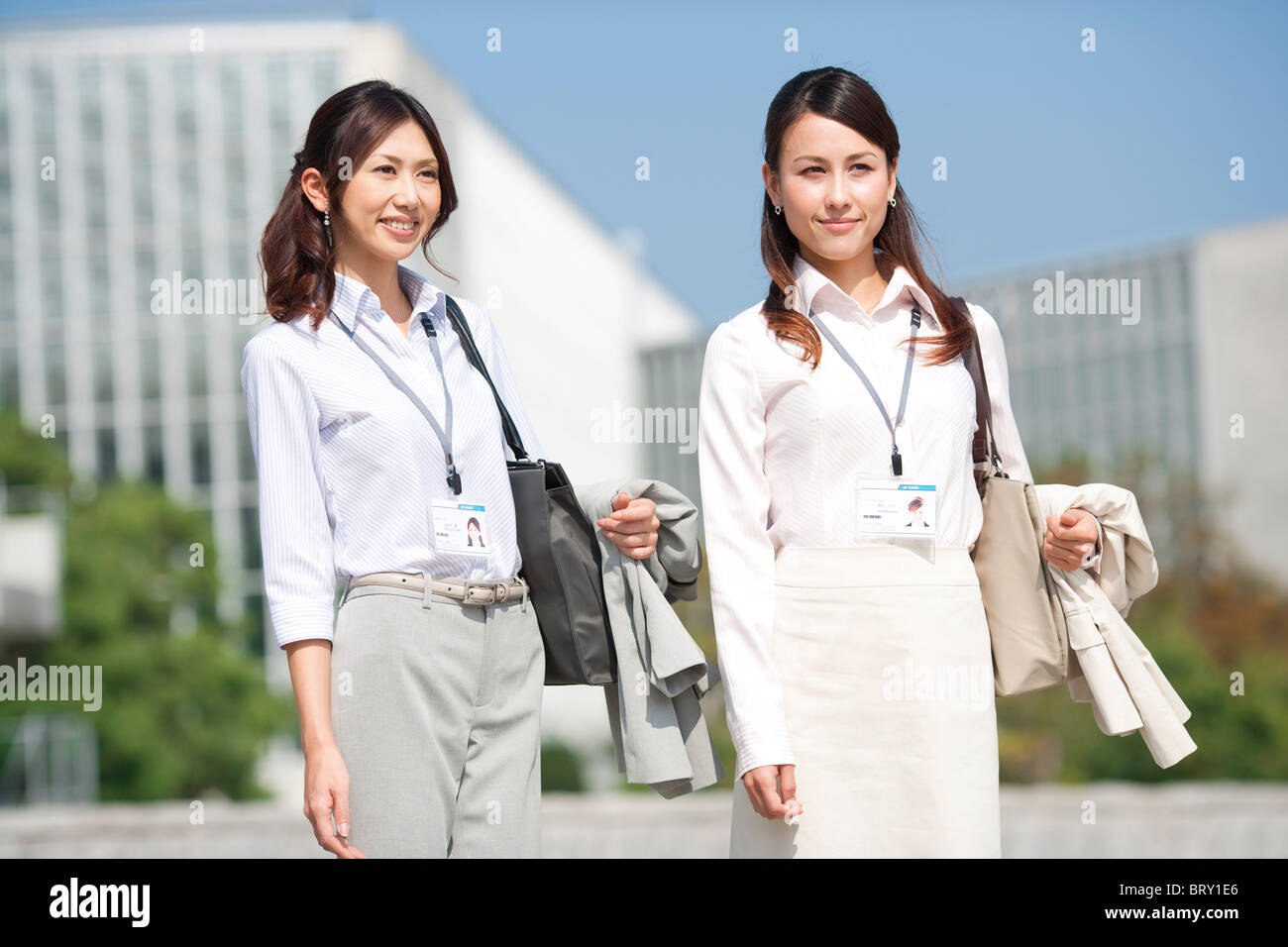 Smiling business women Stock Photo - Alamy