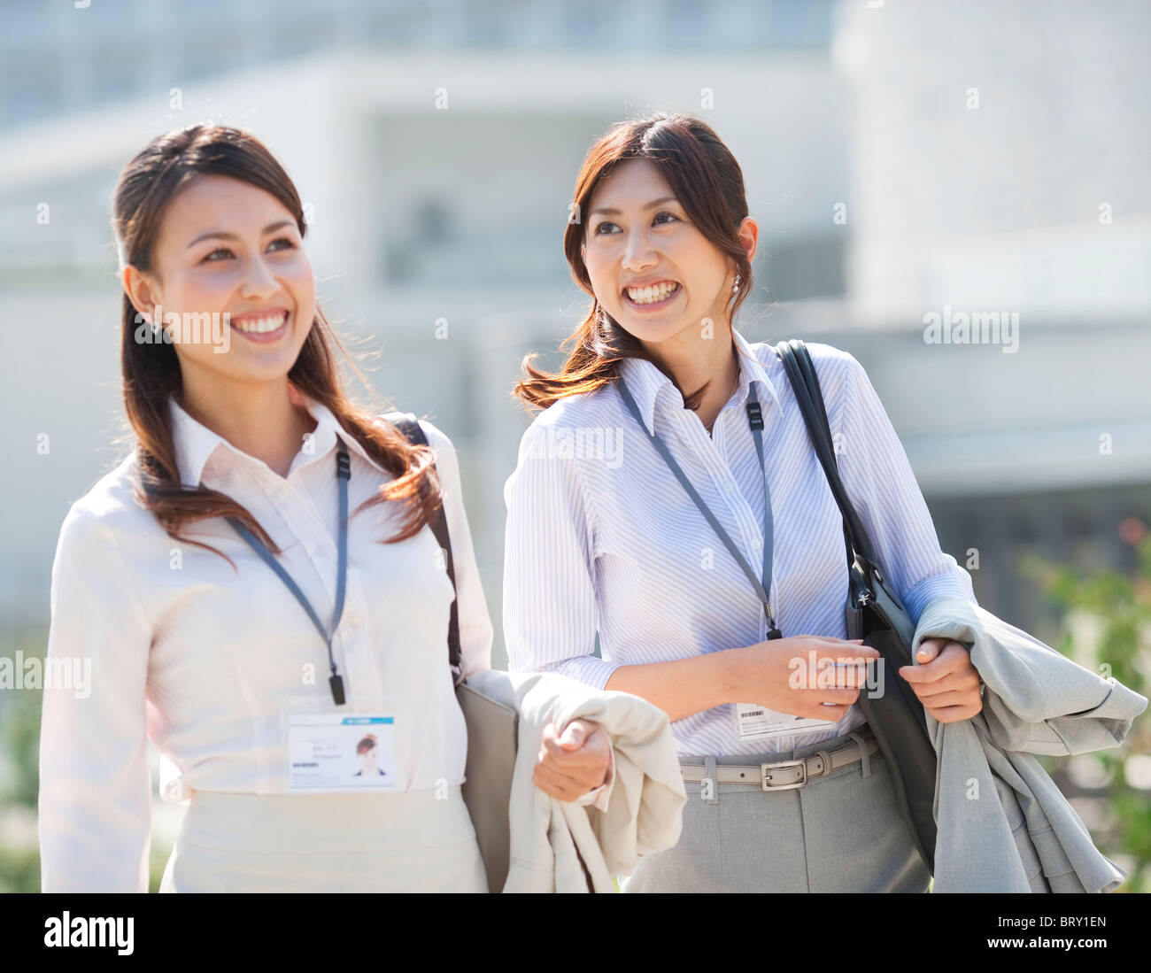 Smiling business women Stock Photo - Alamy