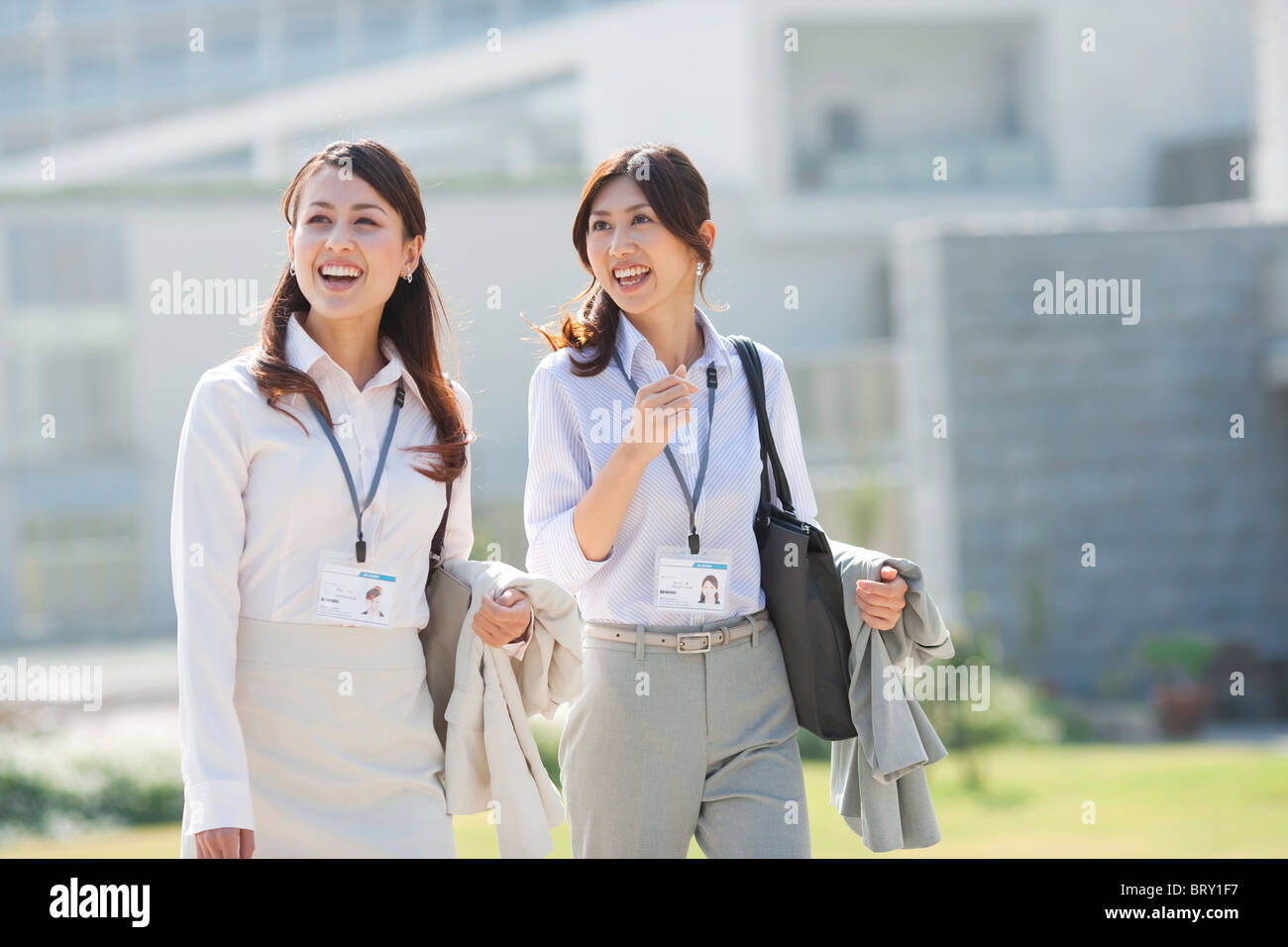 Smiling business women Stock Photo - Alamy