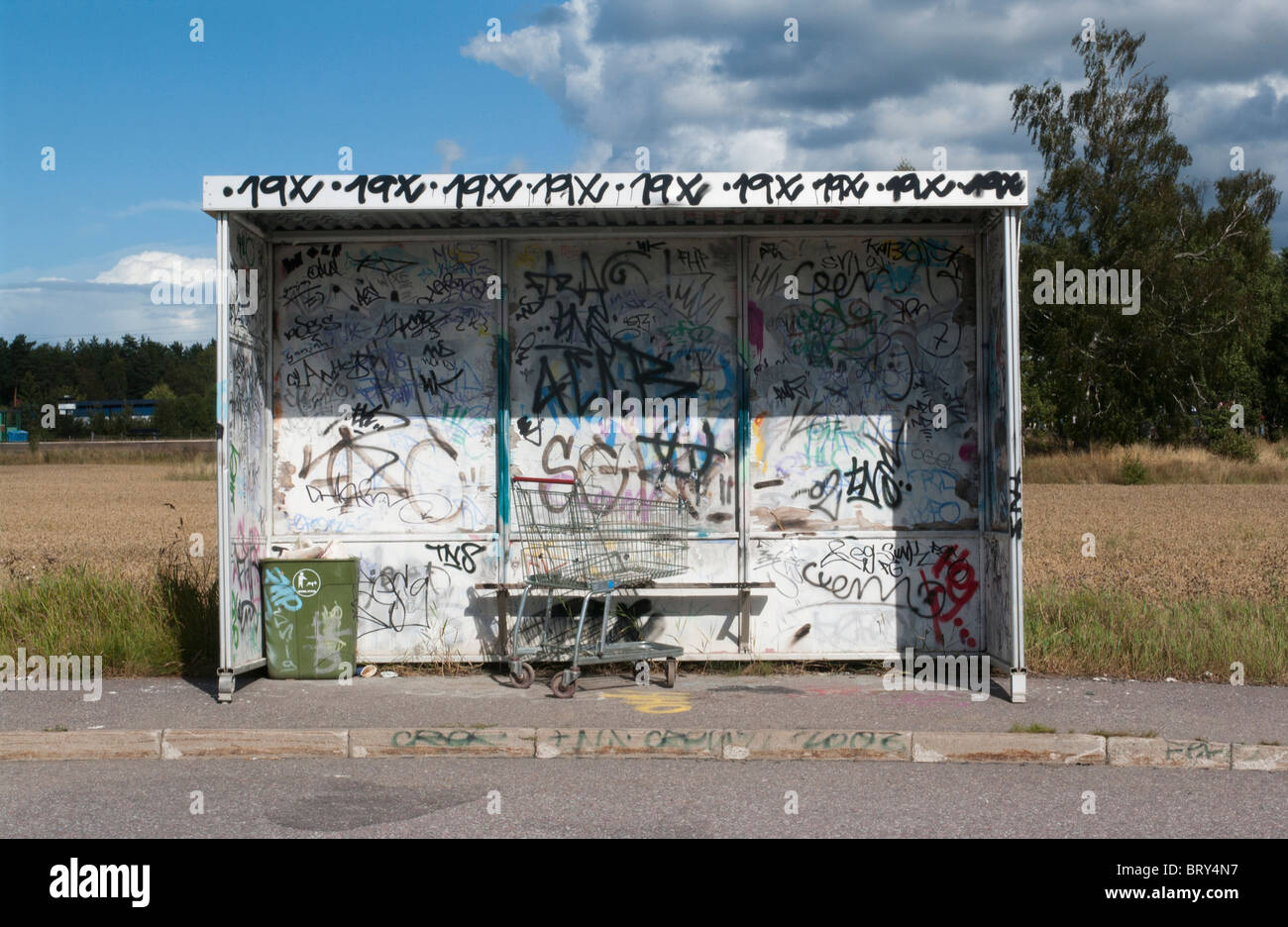 Scrawled bus shelter Stock Photo