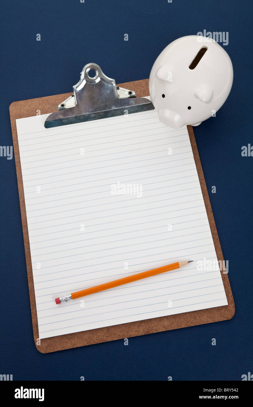 Piggy bank and Clipboard, Concept of Home Finance plan Stock Photo