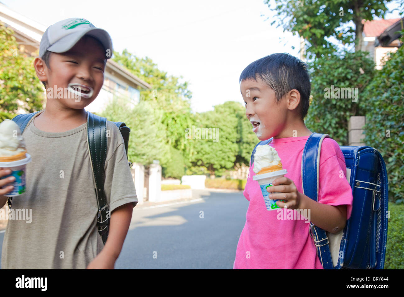 Boys eating ice cream, Japan Stock Photo Alamy