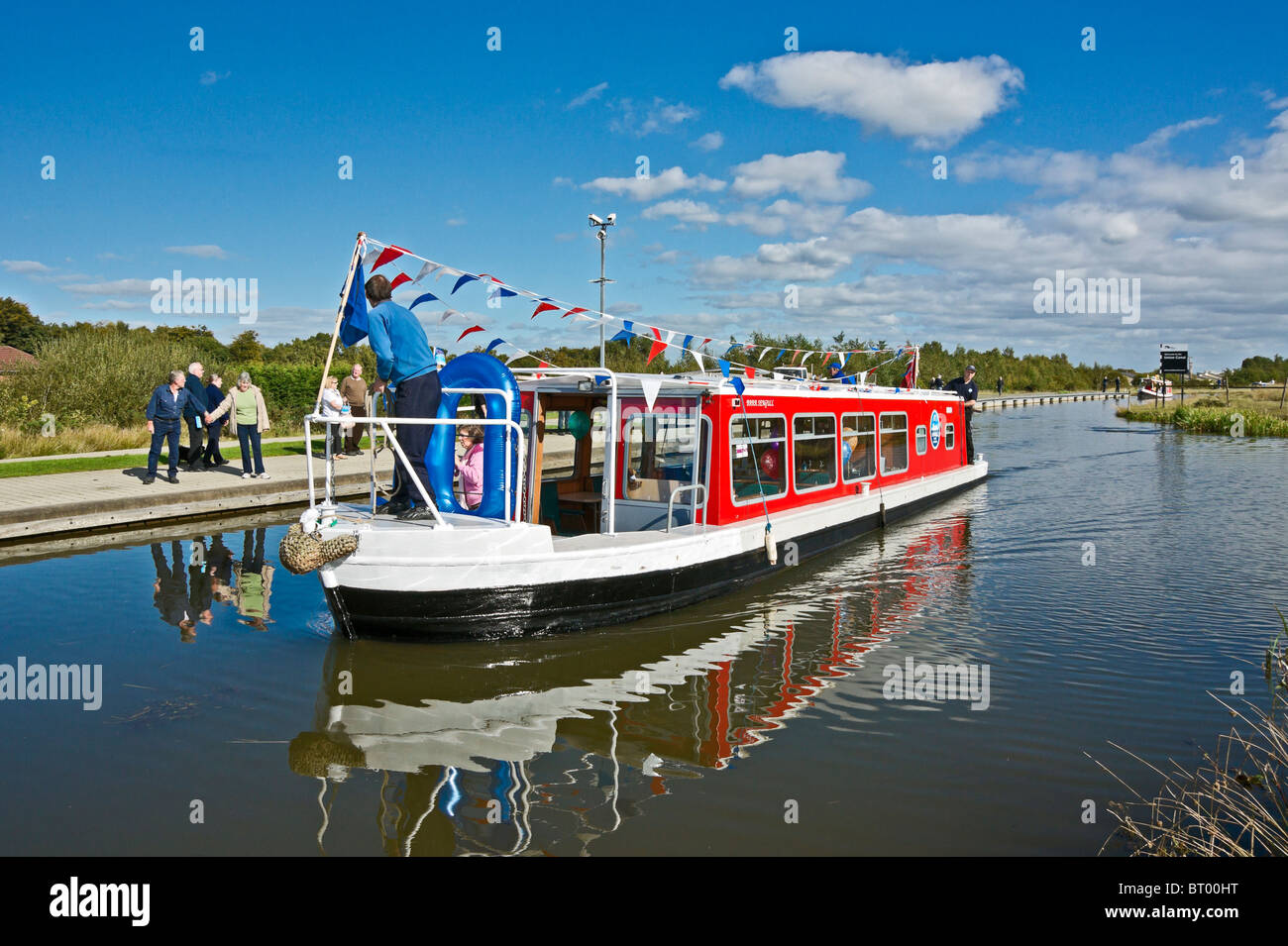 Canal boats arriving at the locks at the Union Canal near the junction with the Forth & Clyde Canal at Falkirk Wheel Stock Photo