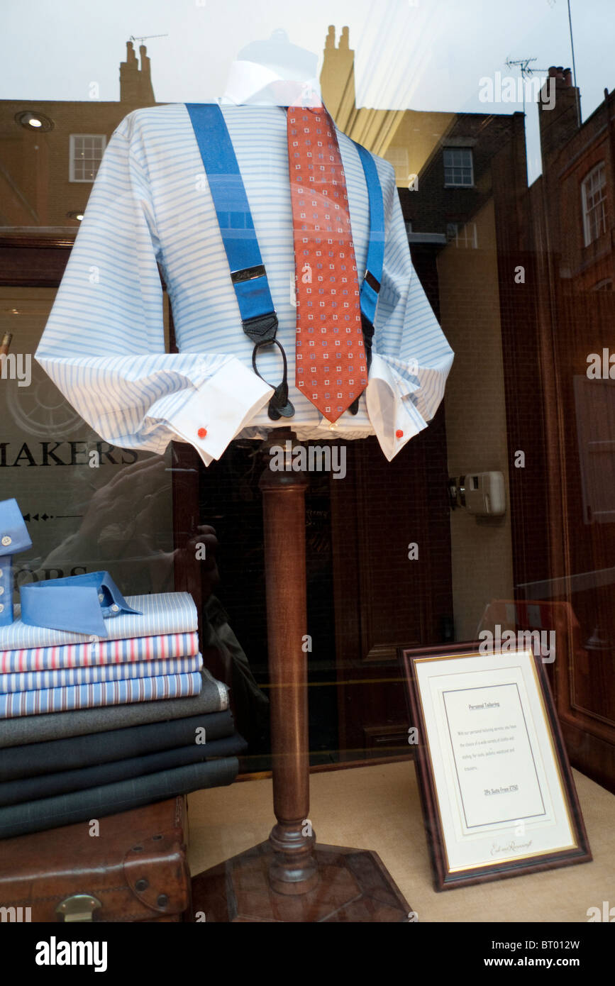 Shirt, red tie and blue suspenders display on a dummy in Ede and