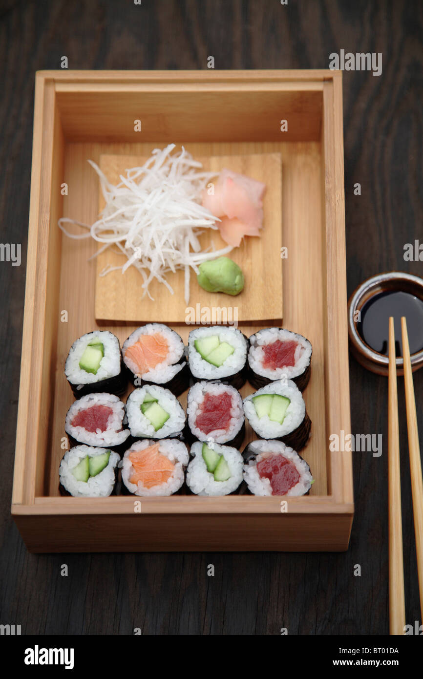 Box of sushi rolls and soy sauce Stock Photo Alamy
