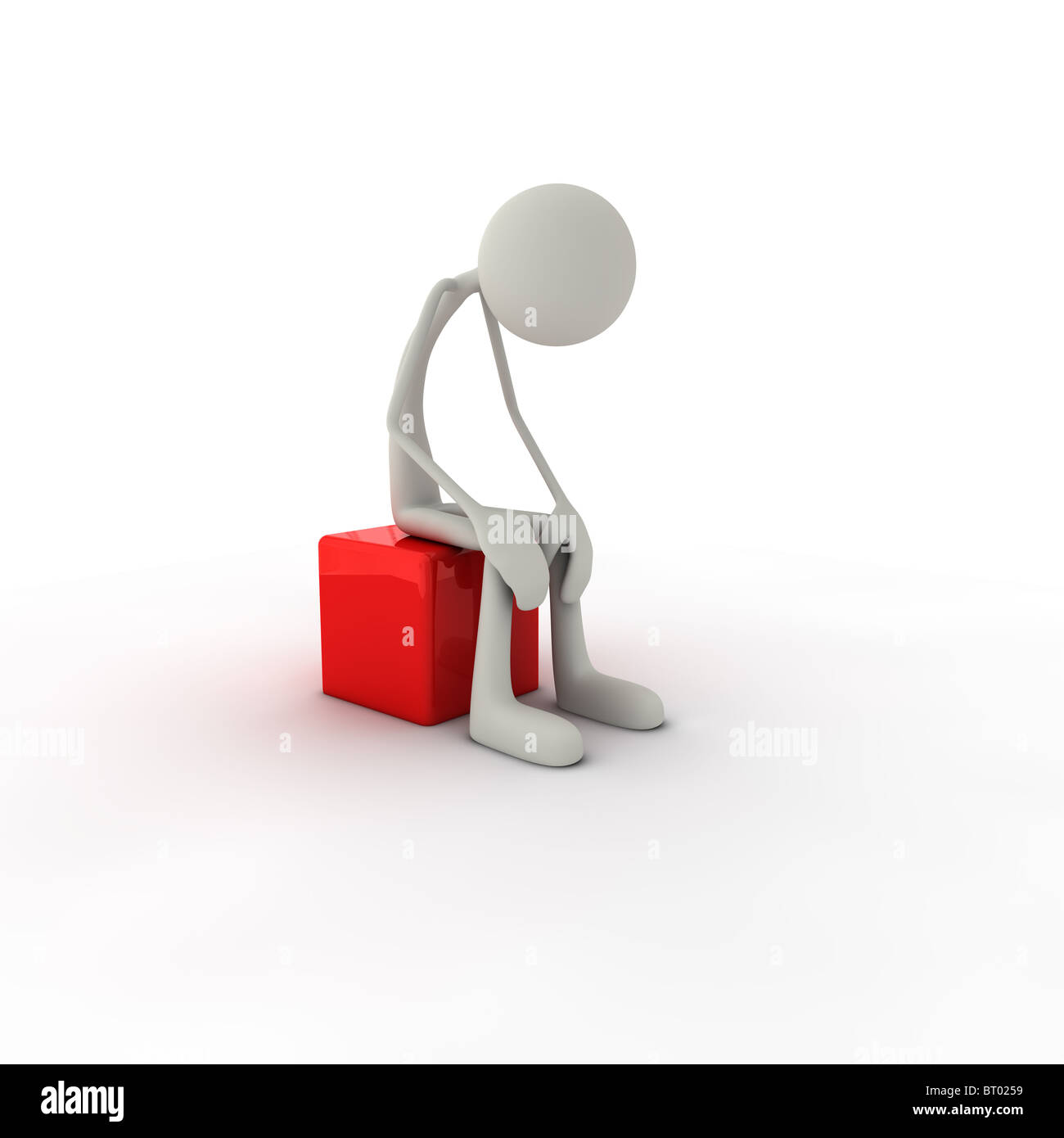 Lonely figure sitting sadly on red cube. Stock Photo