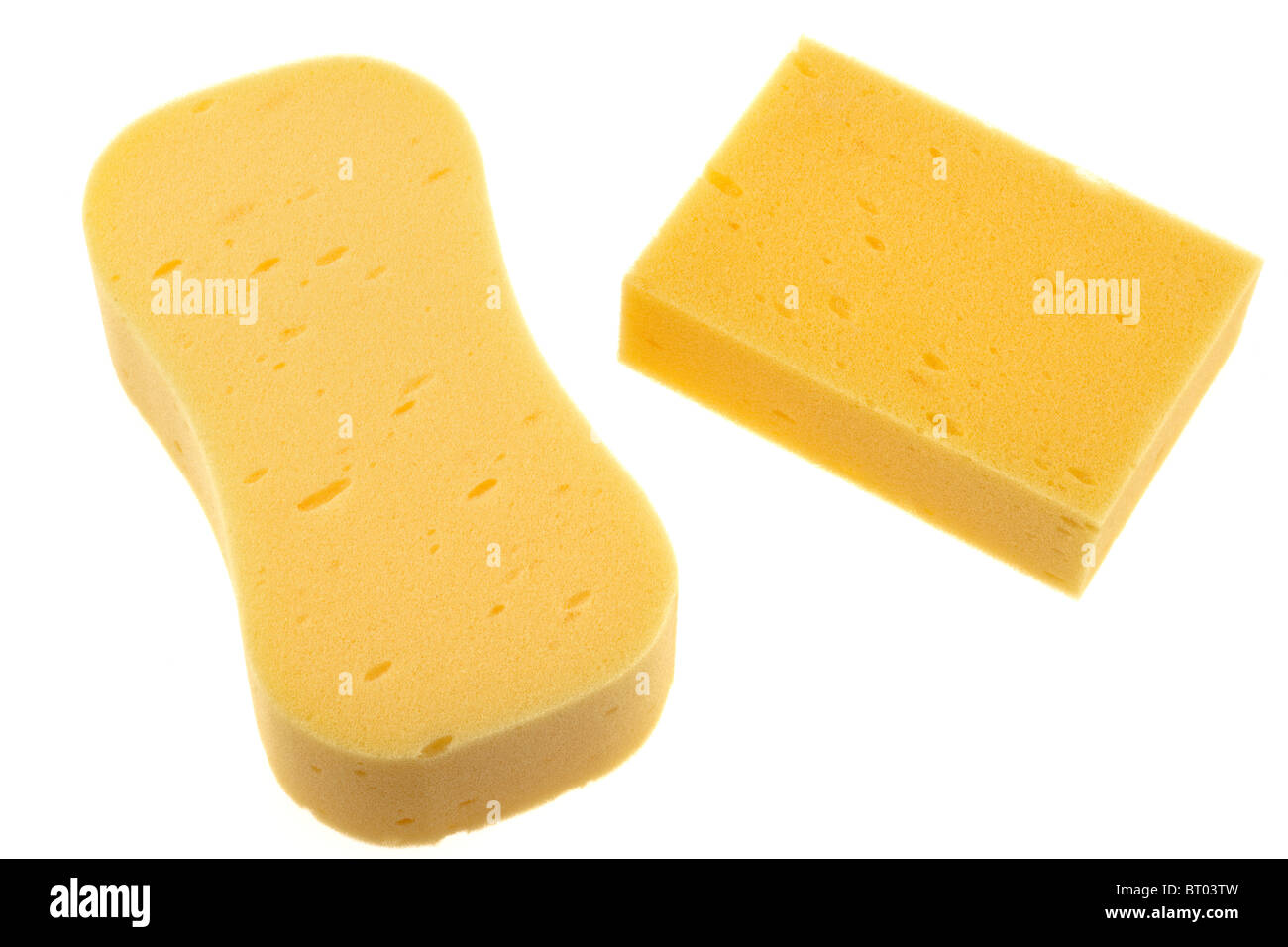 Two yellow sponges Stock Photo