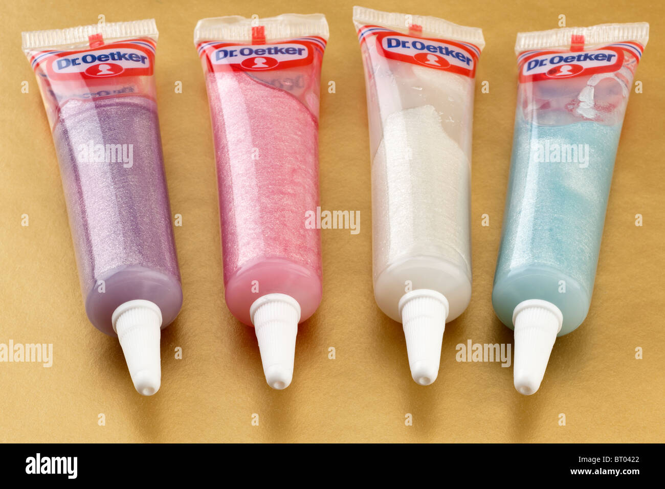 Four plastic tubes of DR Oetker couloured icing gels Stock Photo