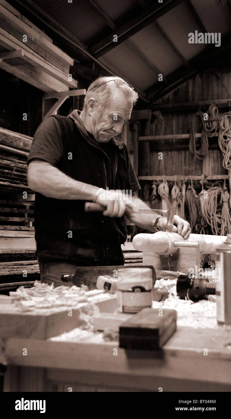 Shetland Boat builder Robbie Tait working in his workshop at the Shetland Museum Stock Photo
