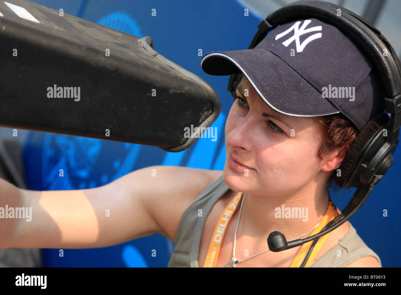 Female camera operator at the tennis stadium, Commonwealth Games, Delhi 2010 Stock Photo