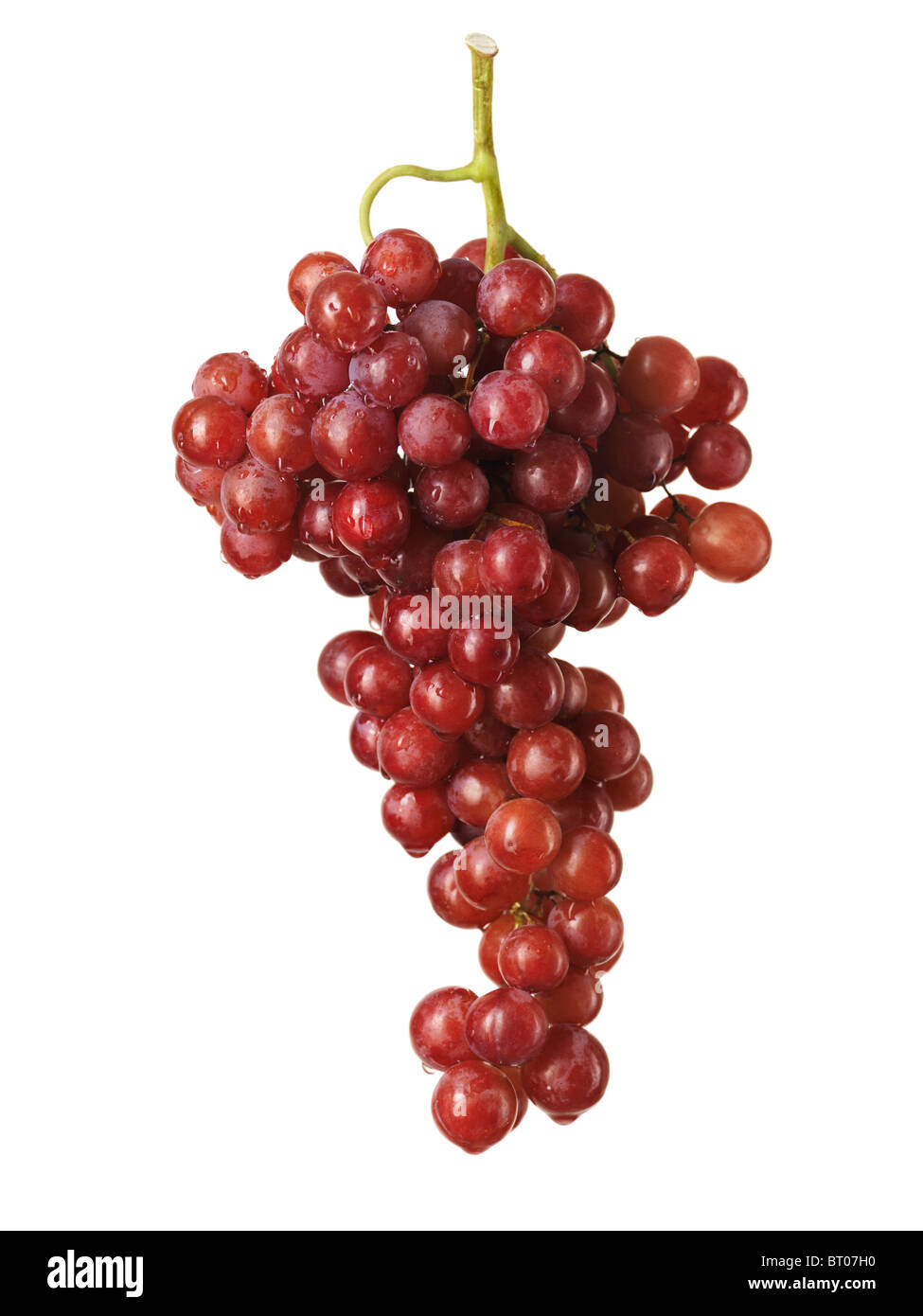 Bunch of red seedless grapes isolated on white background Stock Photo