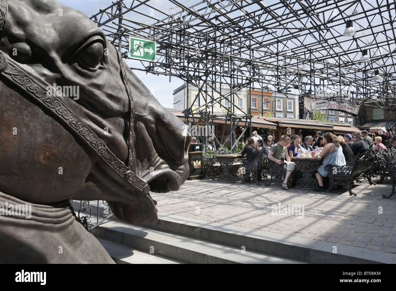 UK, ENGLAND, LONDON. Camden Market, horse sculpture, food stalls and cafe bar Stock Photo