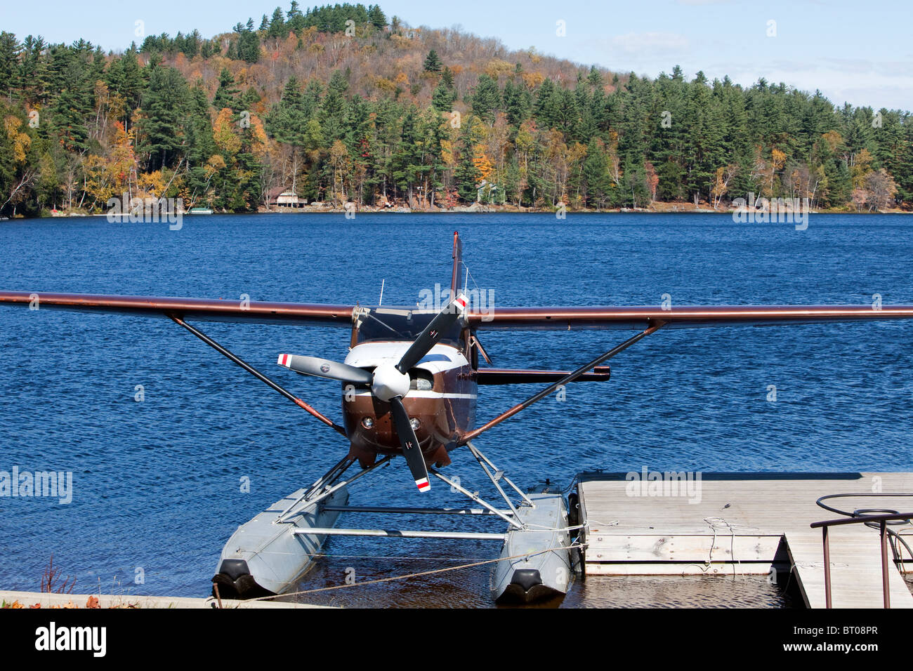Float plane seaplane docked on Long Lake New York in the Adirondack