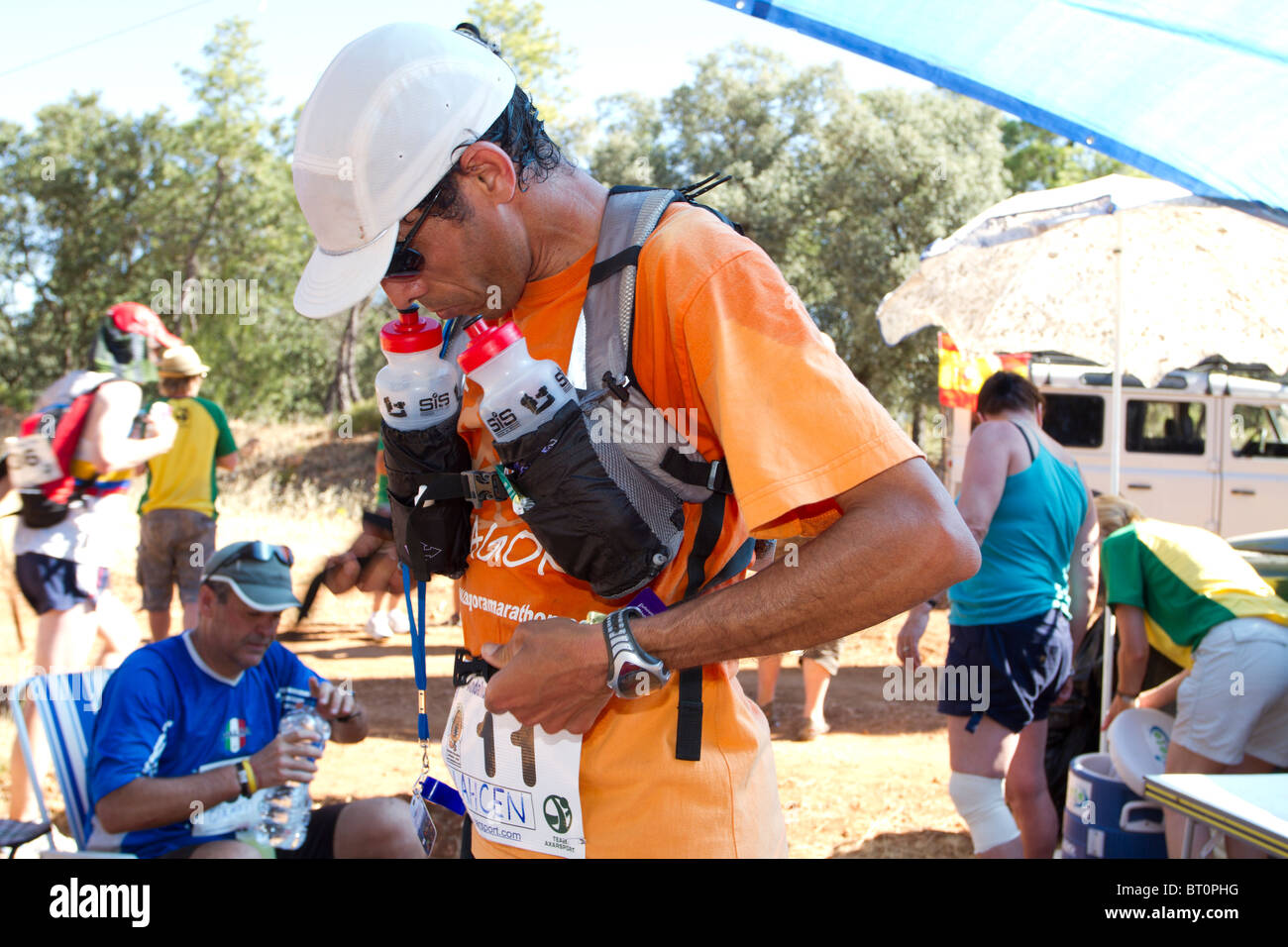 Extreme Distance Runner Moroccan extreme distance runner Lahcen Ahansal gets refreshment ...