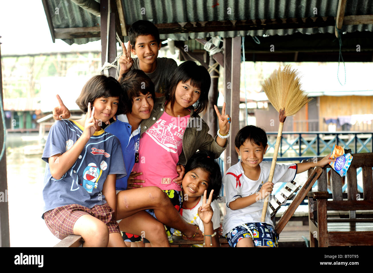 children in houseboat, kheuan khao laem reservoir, sangkhlaburi, thailand Stock Photo