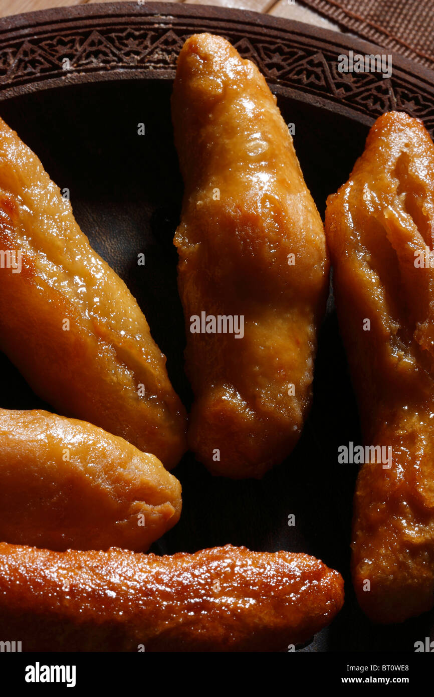 Tosha contains maida (plain flour), curd, baking powder deep fried in