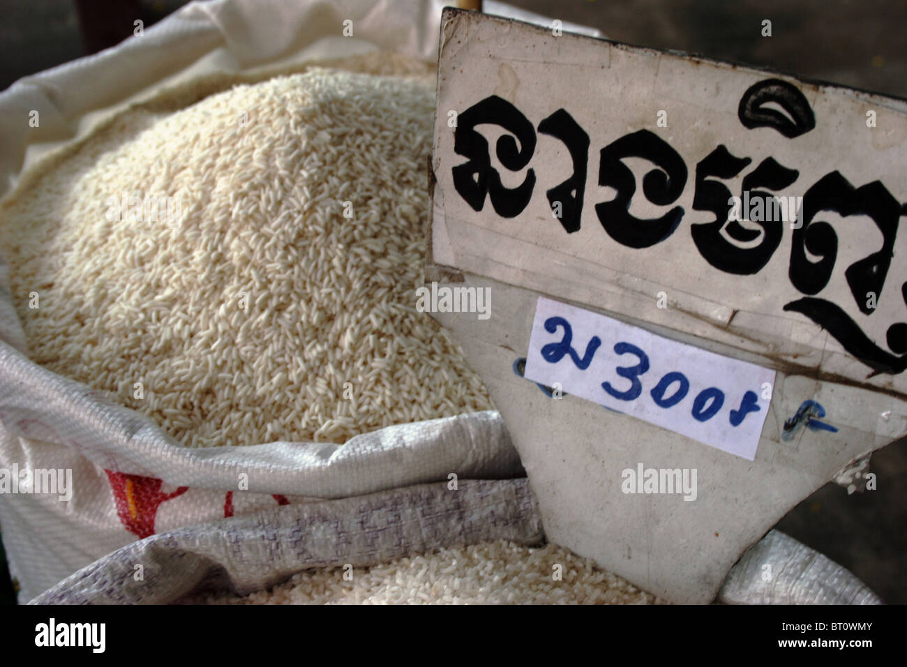 Rice priced by kilograms is ready for sale at a food distribution outlet in Phnom Penh, Cambodia. Stock Photo
