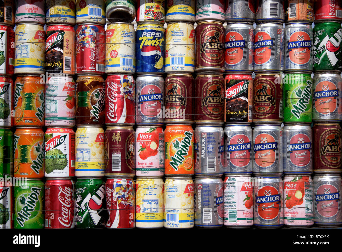 Assorted brands of beer and soft drinks are displayed on a beverage