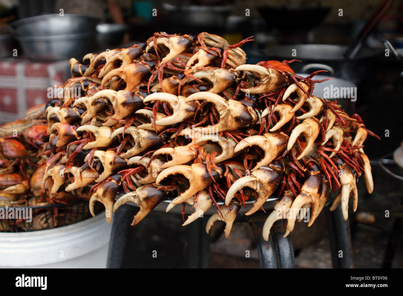 A serving of fresh crab rests on a food vendor's cart awaiting customers in Phnom Penh, Cambodia. Stock Photo