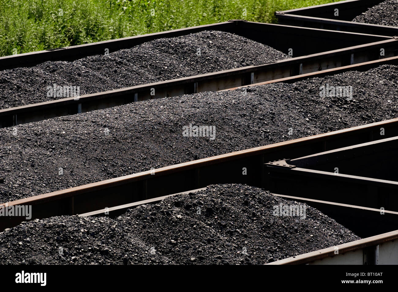 Above three rows of Norfolk Southern Railway and Conrail gondolas cars full of coal in a rail yard in West Virginia, USA. Stock Photo
