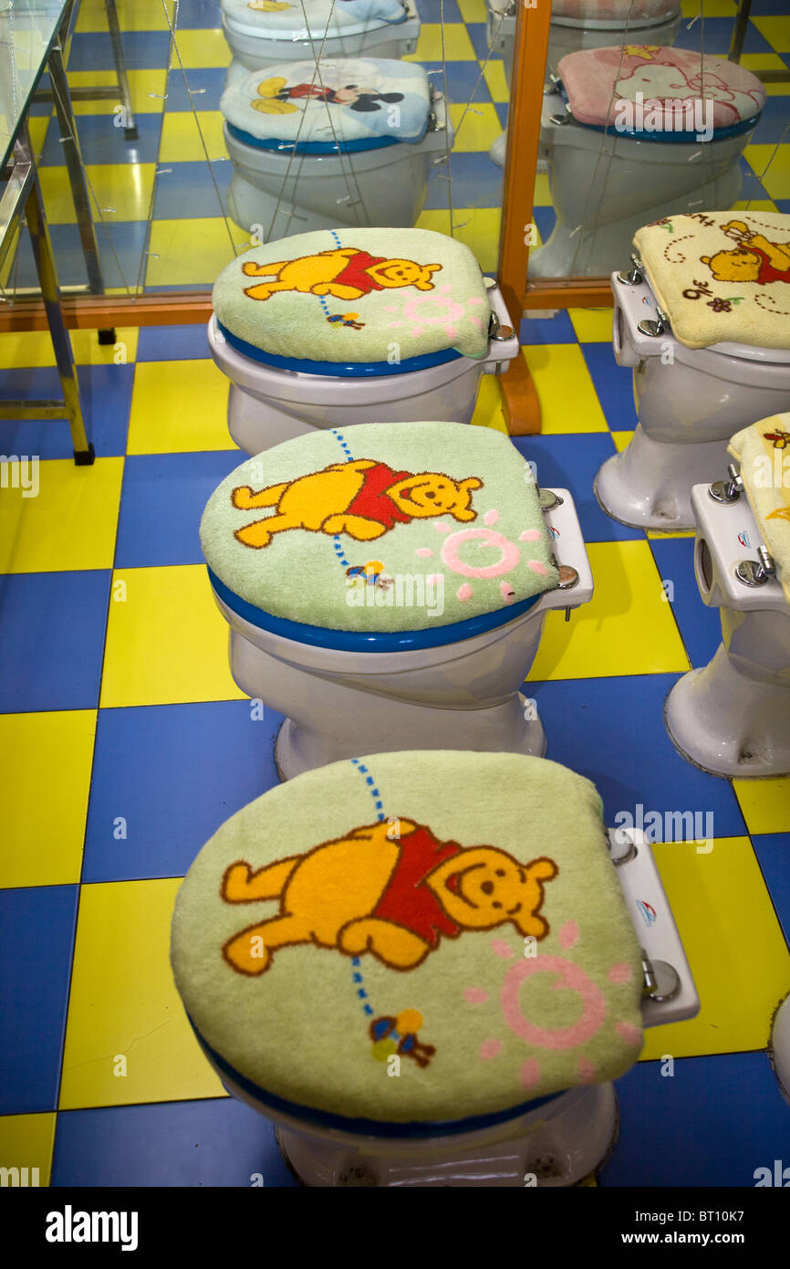 Winnie the Pooh Seat Covers at the Toilet Restaurant Beijing China Stock Photo