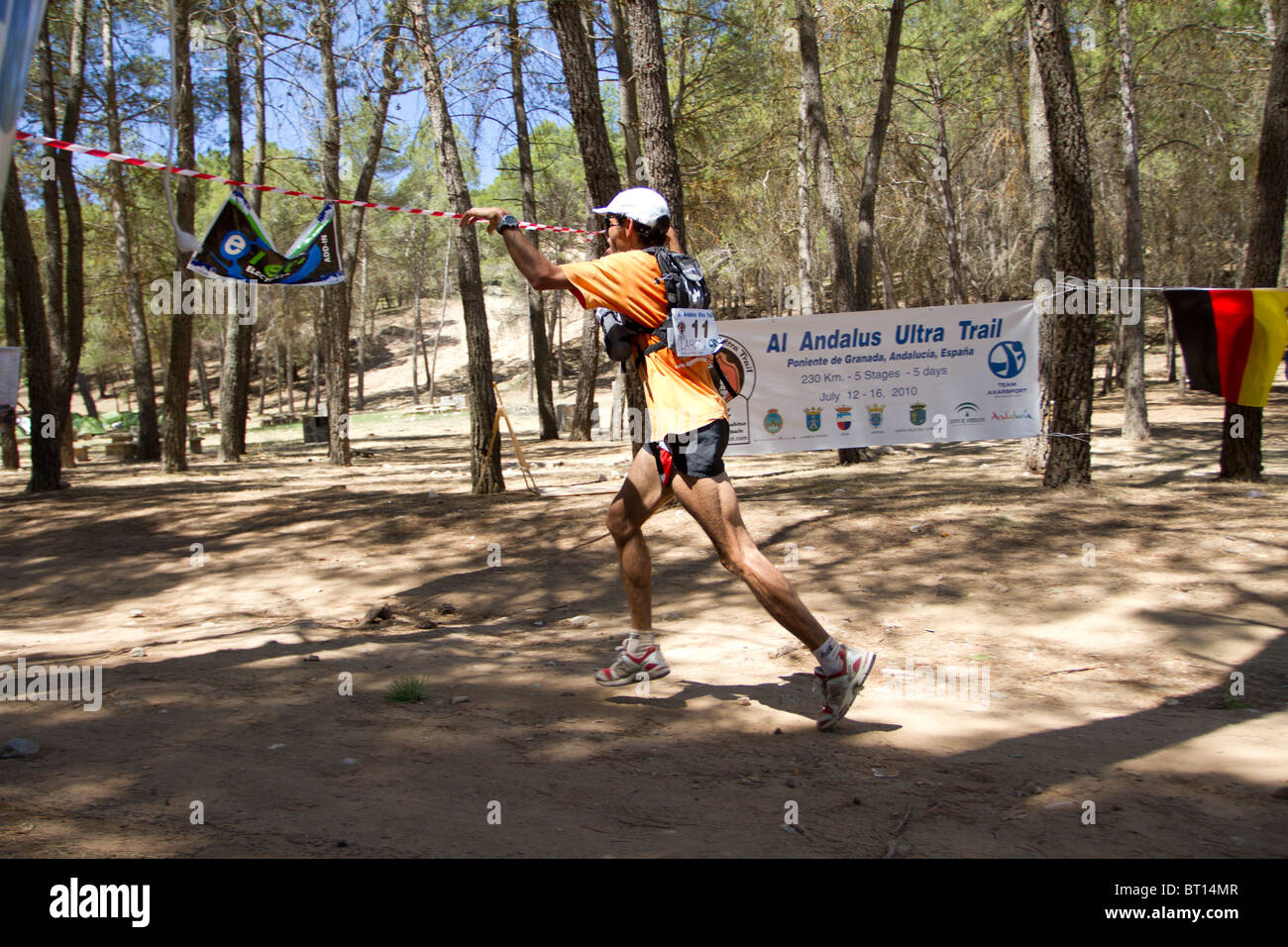 Lahcen Ahansal does his trade mark jump at the finish line as he wins