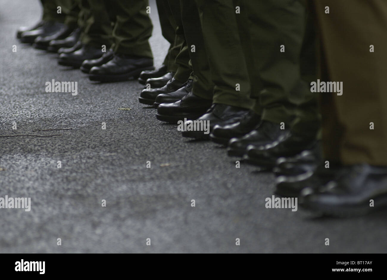 Soldiers and Civilians alike gather to commemorate the dead on Remembrance Sunday 2006 in Royston, Hertfordshire, UK Stock Photo