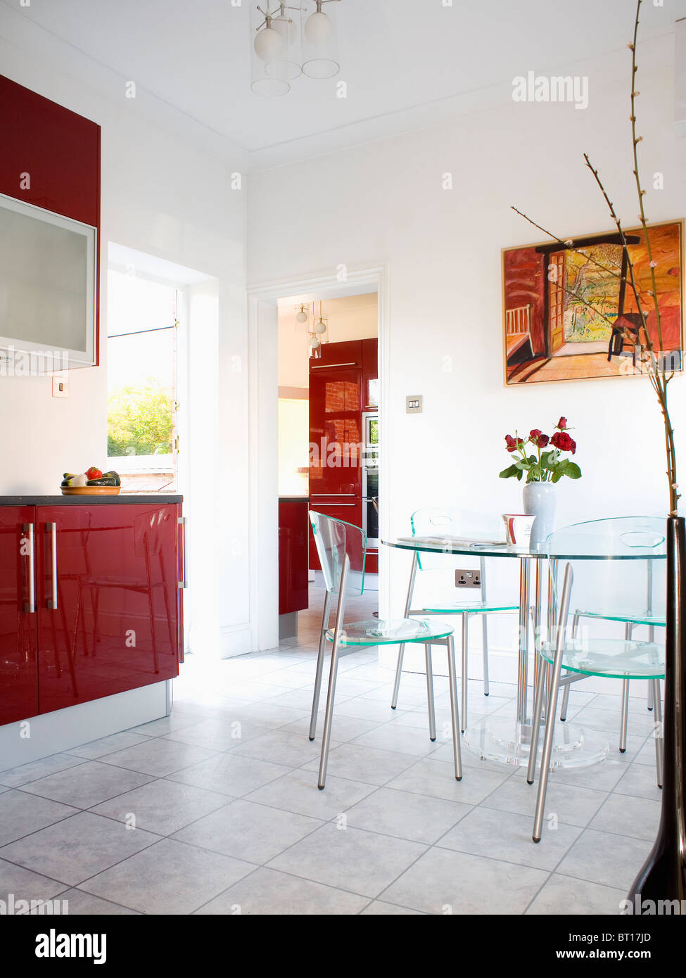 Perspex Kitchen Table Glass table and perspex chairs in modern kitchen dining room with ...