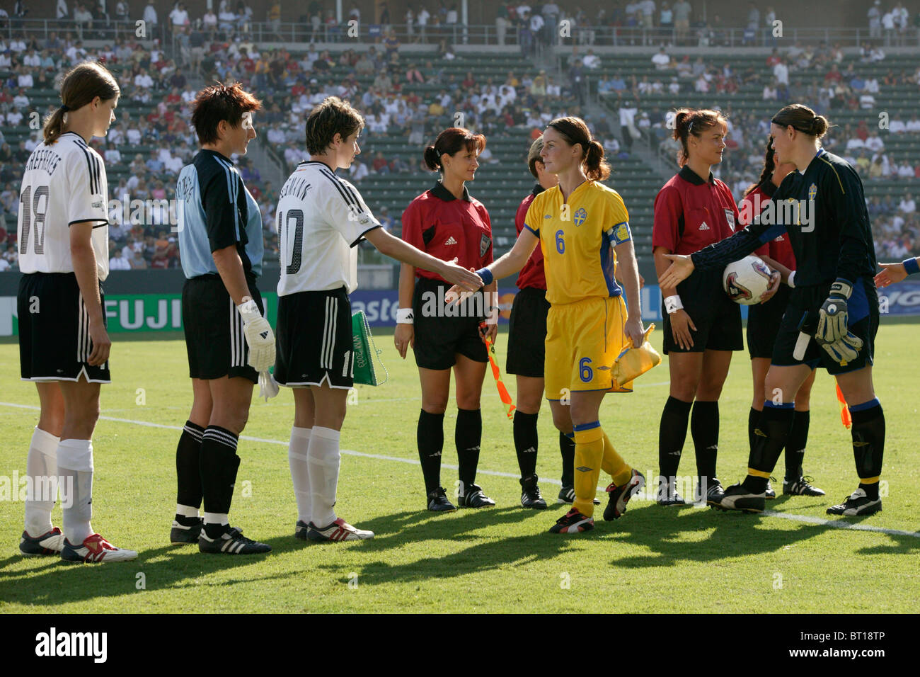 Germany team captain Bettina Wiegmann (10) shakes hands with Sweden captain Malin Mostrom (6) -  2003 Women's World Cup final. Stock Photo