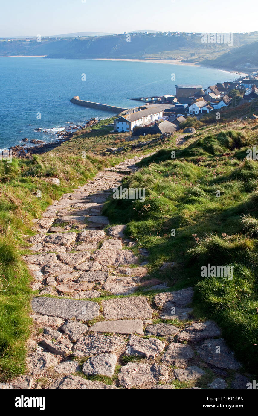 the south west coast path leading down to the village of sennen in cornwall, uk Stock Photo
