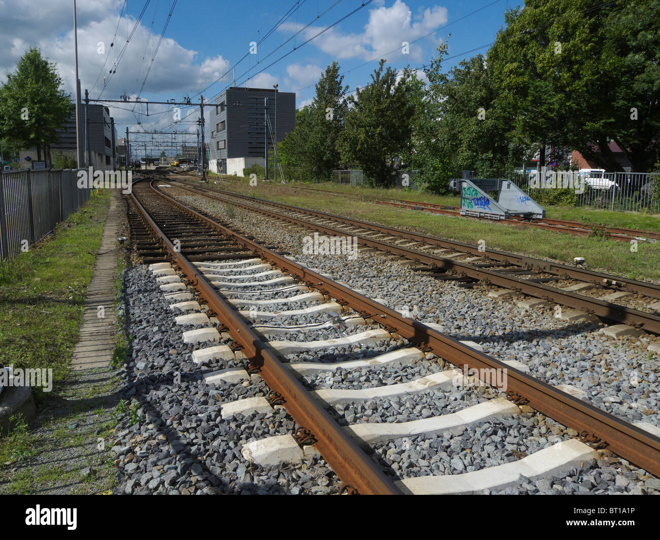 Railways tracks leading towards the station at Heerlen, The Netherlands. Stock Photo