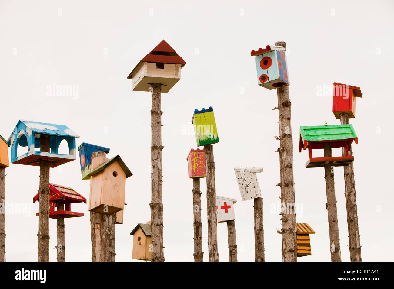 A collection of colourful bird boxs in Hveragerdi, Iceland. Stock Photo