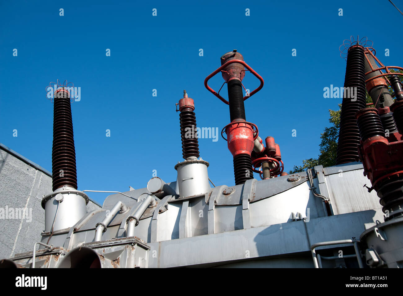 Ceramic high voltage isulators of power station. Stock Photo