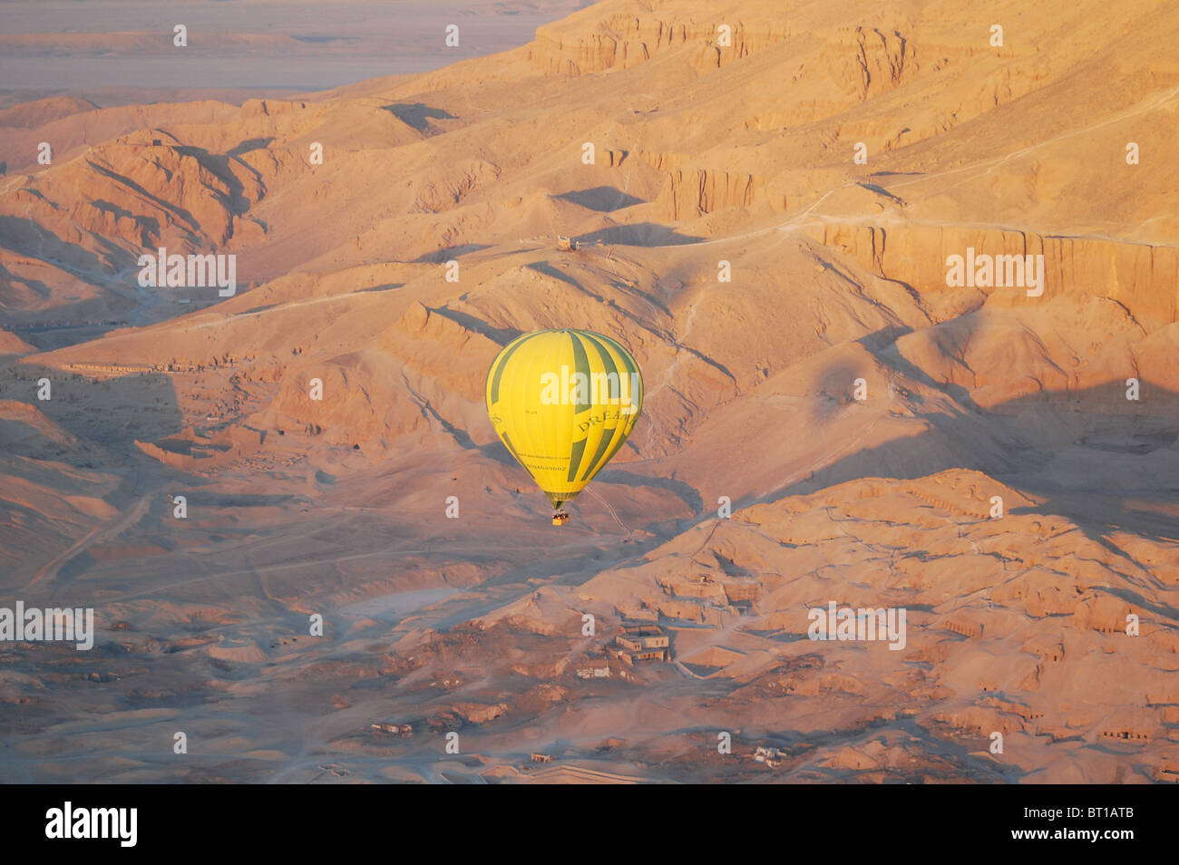 Hot air balloon ride above the Valley of the Kings, Luxor, Egypt at dawn Stock Photo