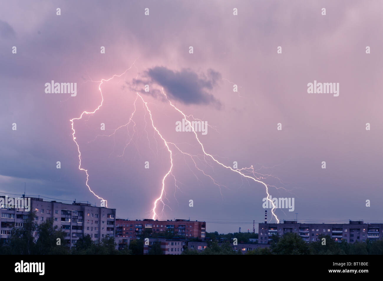 lightning over a city Stock Photo - Alamy