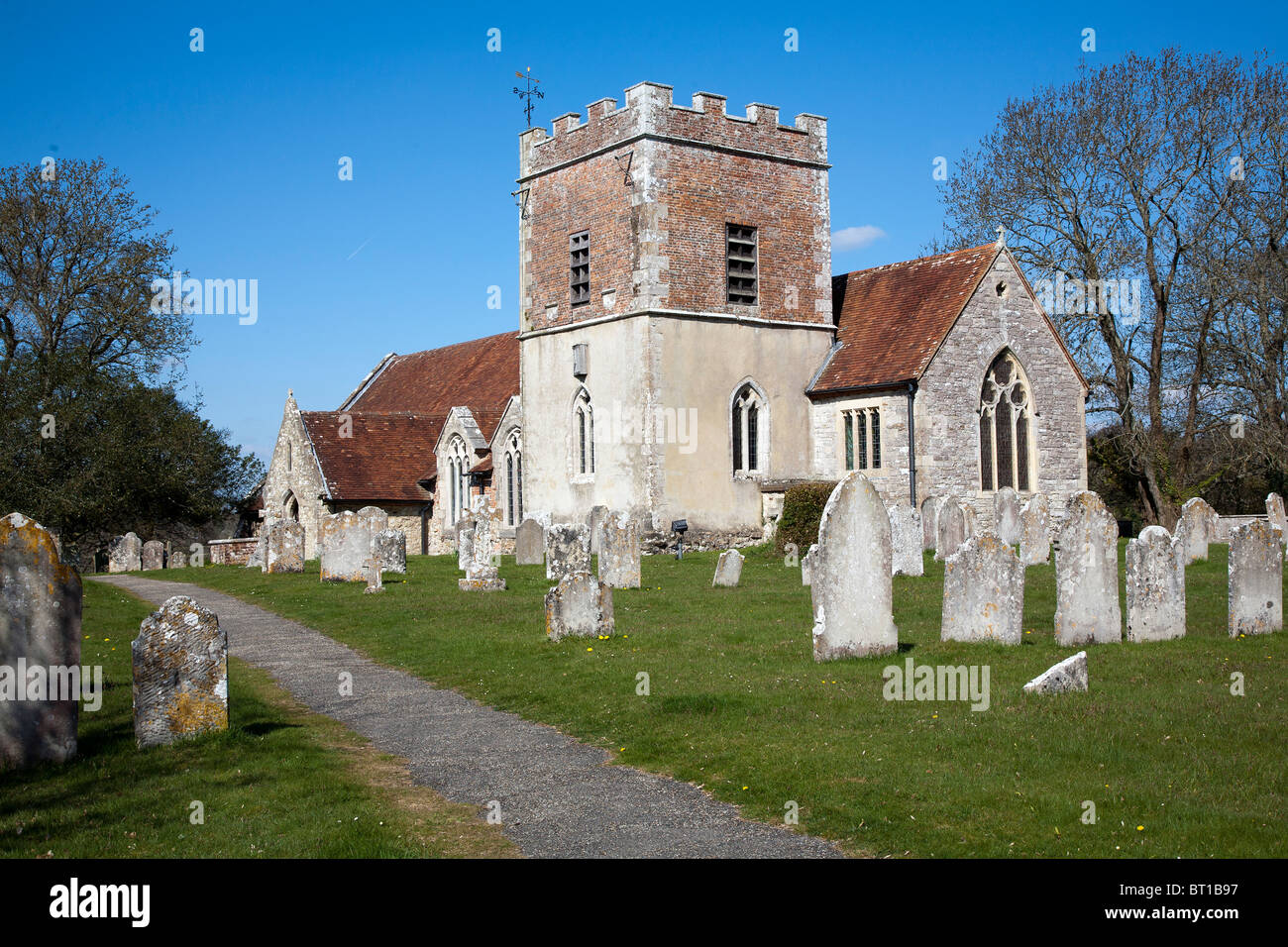 St John the Baptist a small traditional stone built church in the village of Boldre in the New Forest near Lymington Stock Photo
