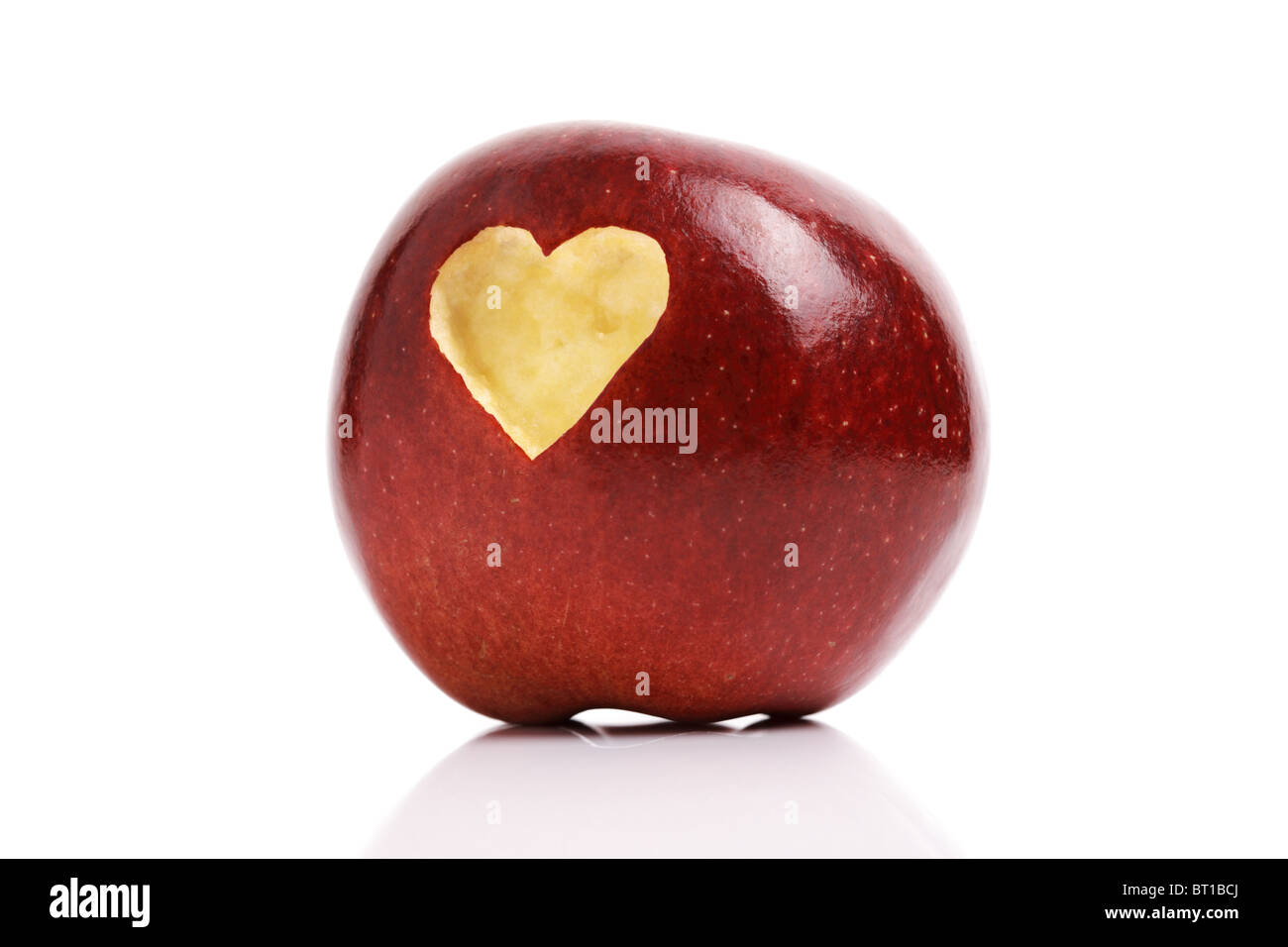Red apple with heart symbol Stock Photo