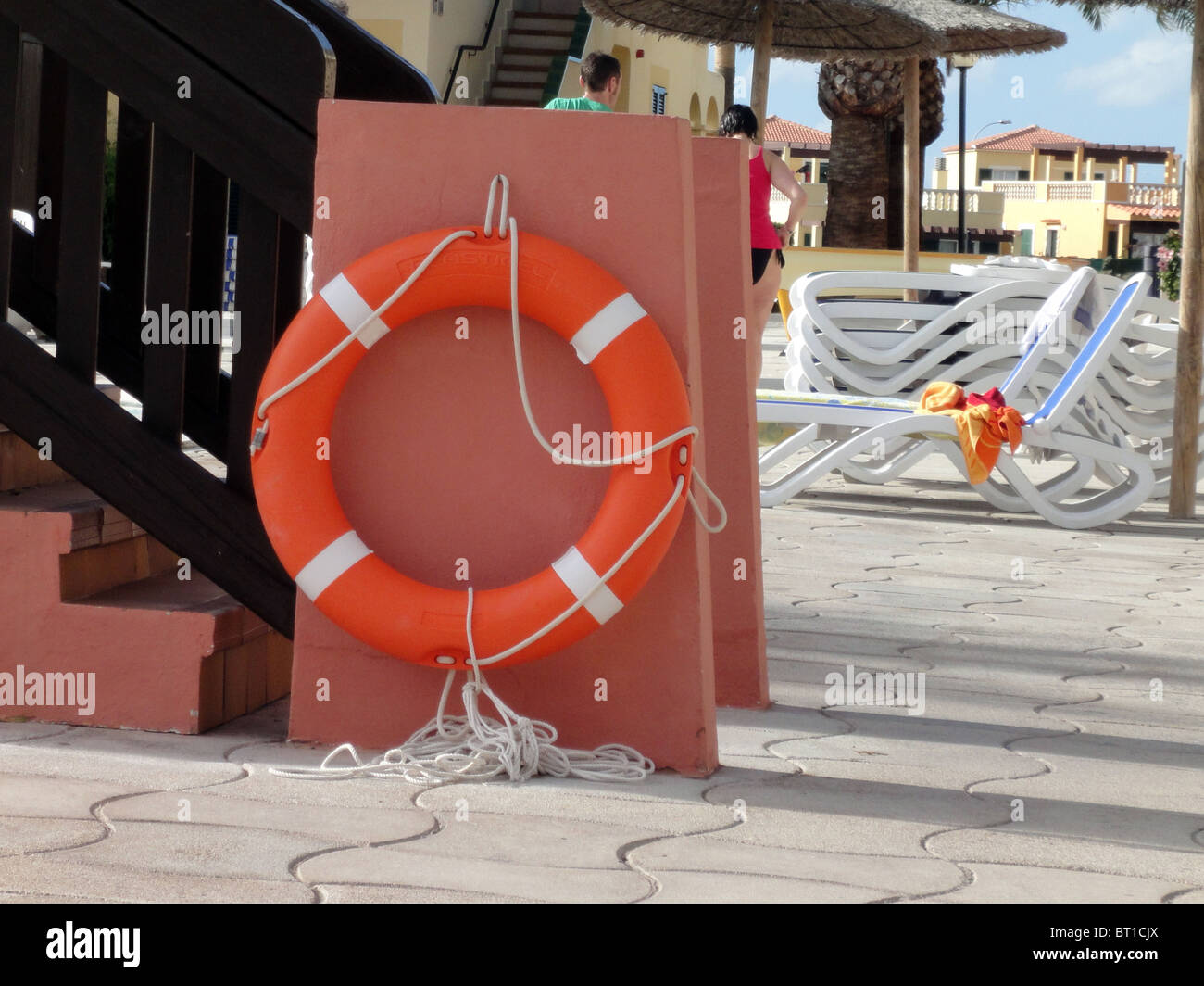 A rescue ring near a swimming pool Stock Photo