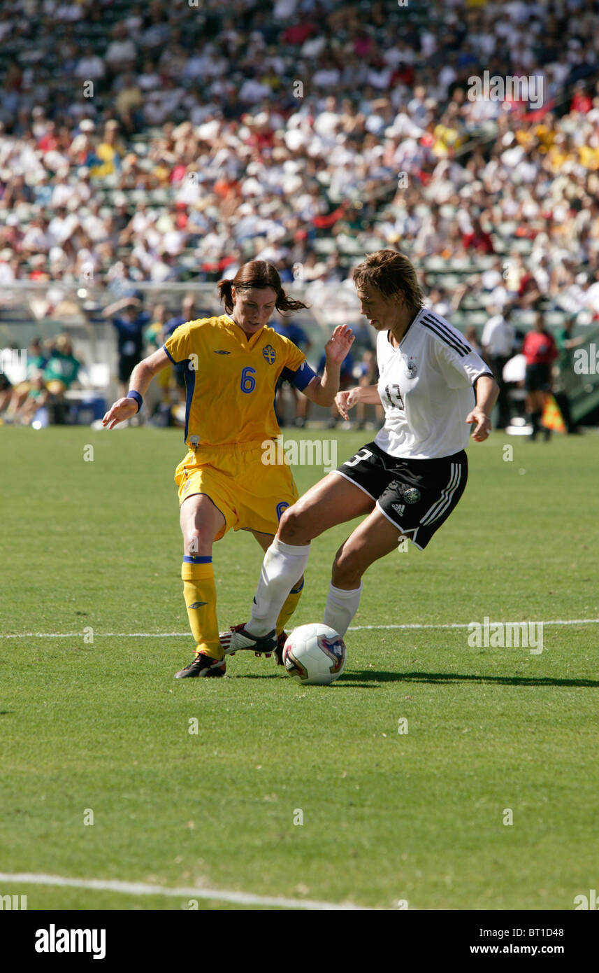 Malin Mostrom of Sweden (6) battles Germany's Sandra Minnert (13) during the 2003 Women's World Cup soccer final. Stock Photo