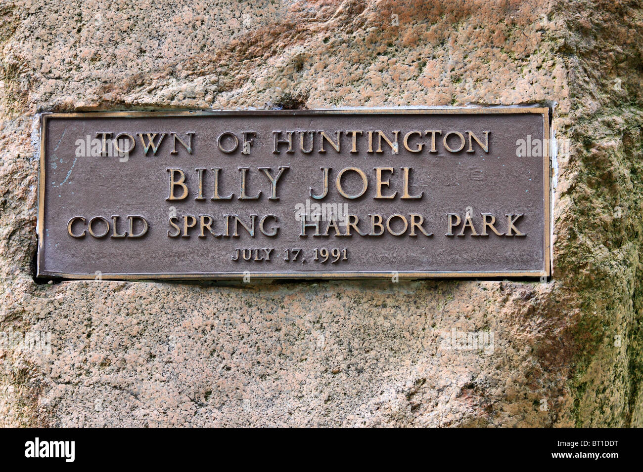 Plaque on rock commemorating naming of park in honor of famous musician ...