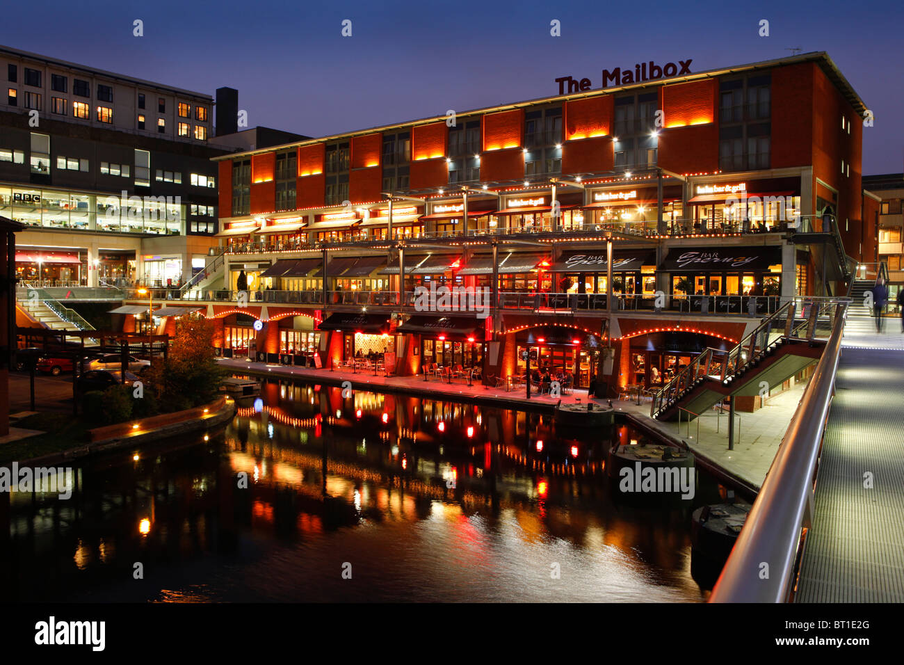 The Mailbox development at night, showing bars and restaurants along