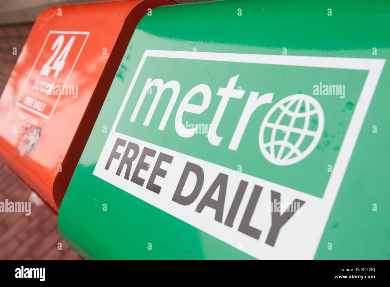24 hours free daily and metro free daily newspapers boxes sit side by side in Ottawa Sunday