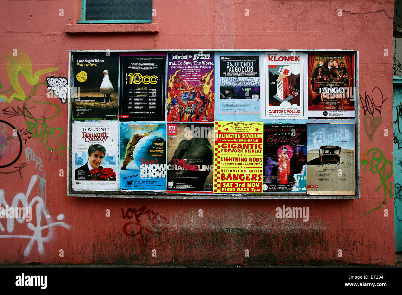 Wall with posters hi-res stock - photography Alamy images and