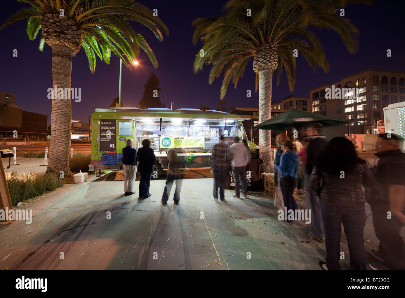 Night image of a taco truck at the annual Eat Real Food Festival in Oakland's Jack London Square. Stock Photo