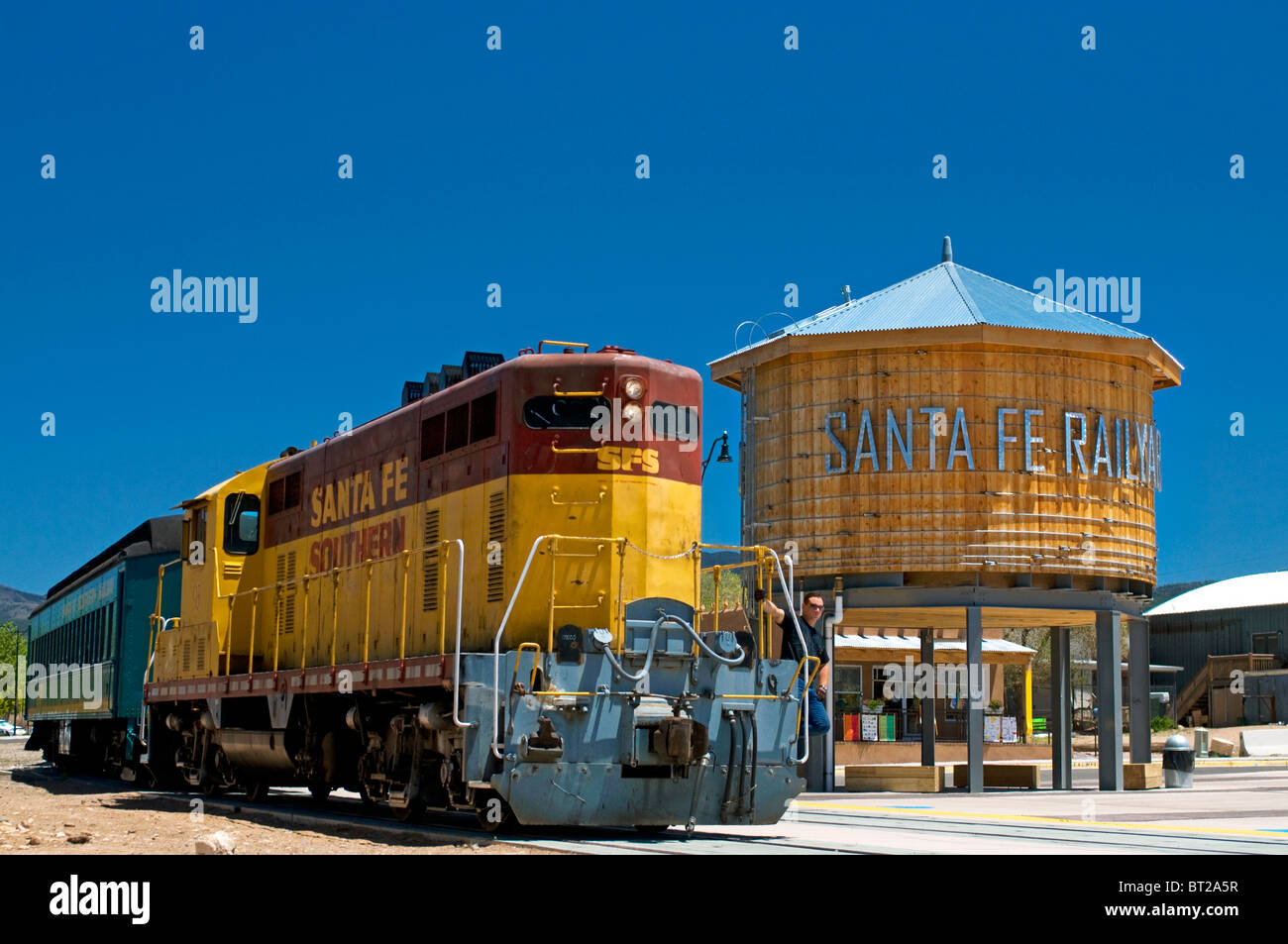 Locomotive train engine leaving Santa Fe Railyard Railrunner station Stock Photo