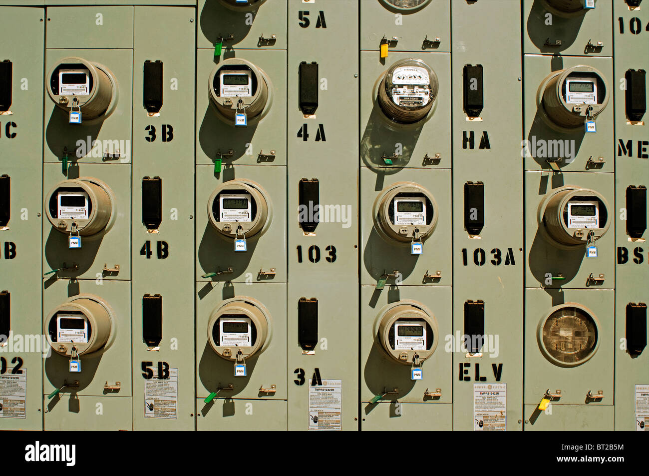 Round electrical meters on large control panel Stock Photo Alamy
