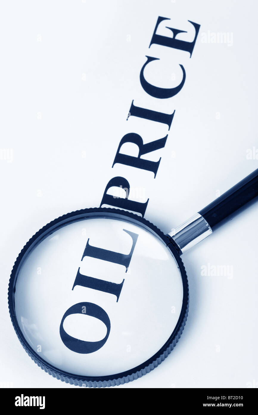 headline oil price and magnifier, concept of oil price decision Stock