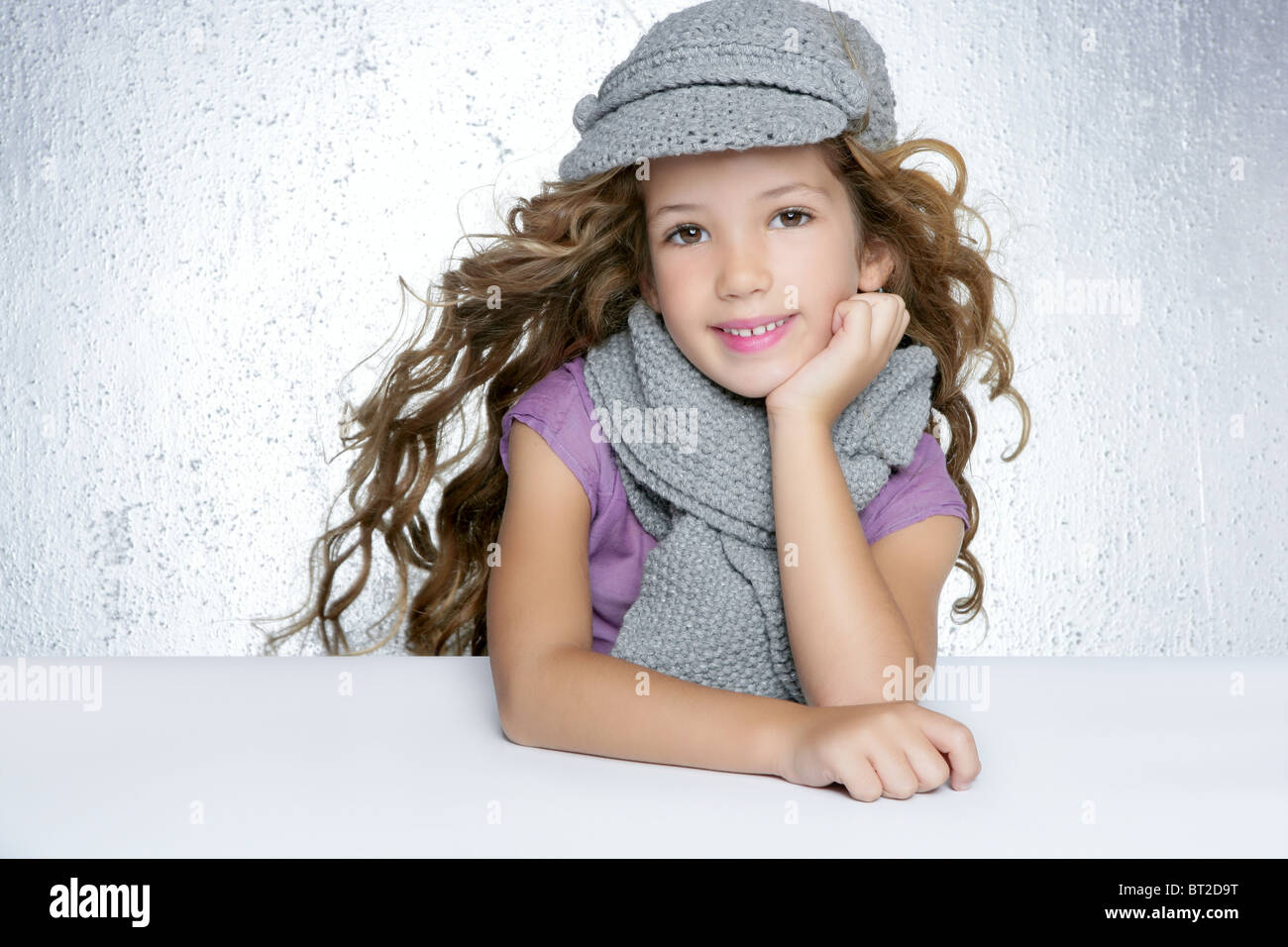 winter cap wool scarf little fashion girl wind on hair portrait gray background Stock Photo - Alamy winter cap wool scarf little fashion girl wind on hair portrait gray background Stock Photo - Alamy